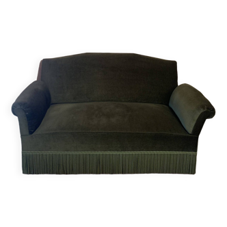 Green velvet bench with fringe