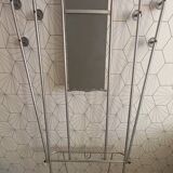 Vintage aluminum wall coat rack.