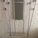 Vintage aluminum wall coat rack.