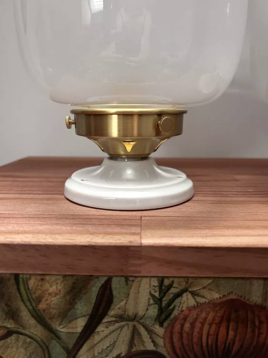 Pair of two-tone globe wall lights