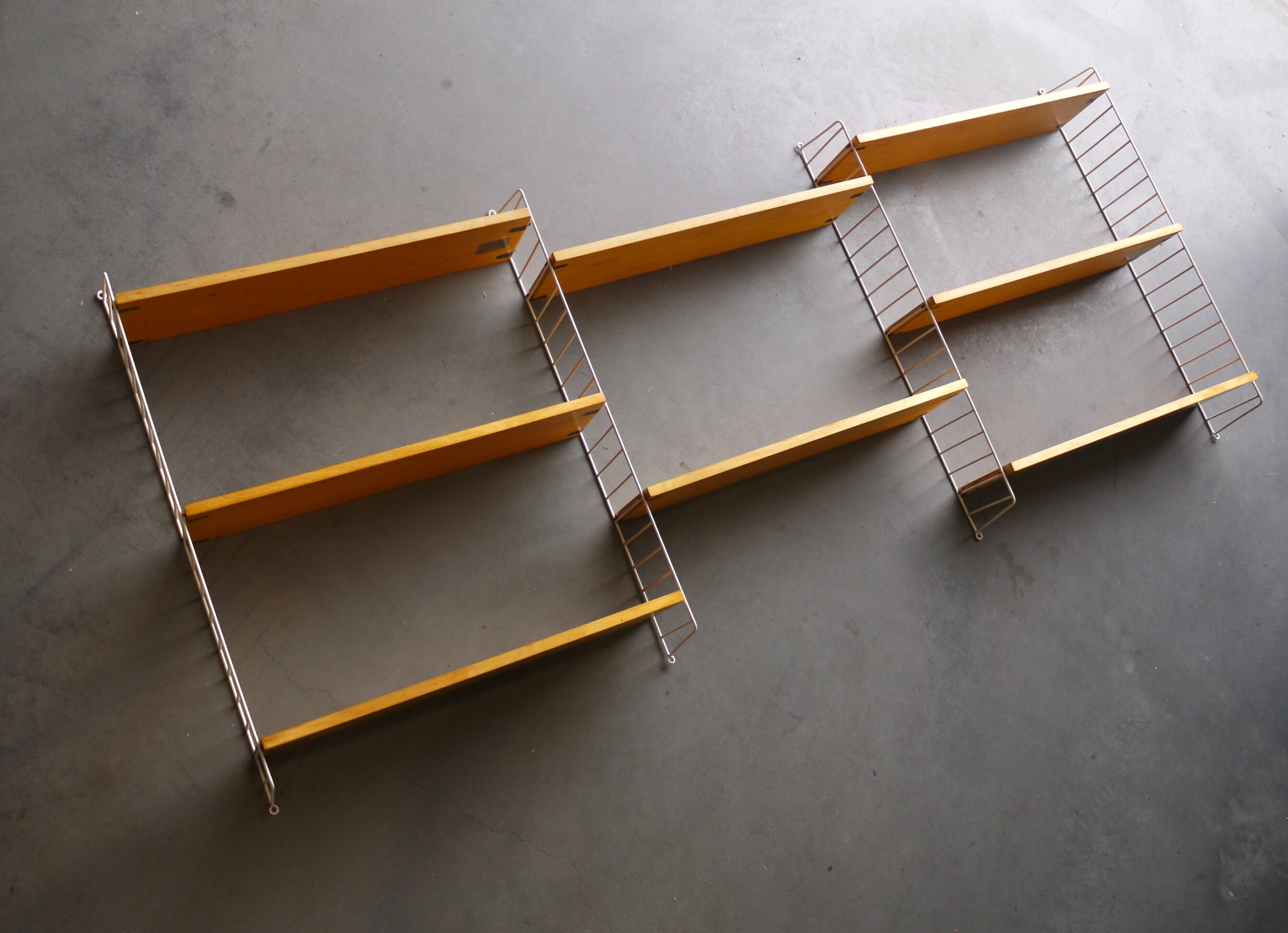Vintage wall shelving unit by Nisse Strinning for String AB. 1950s