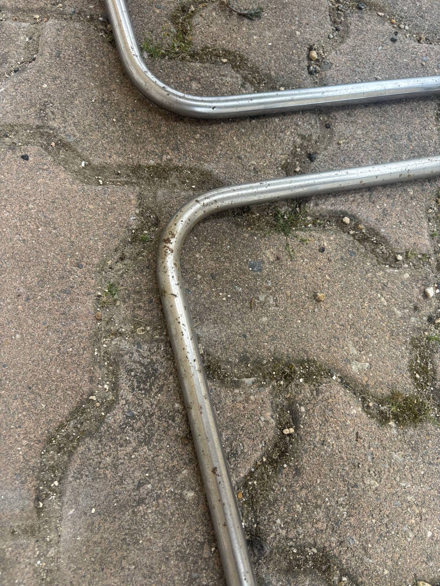 Four vintage chairs from the 1960s and 1970s, chrome with faux leather.