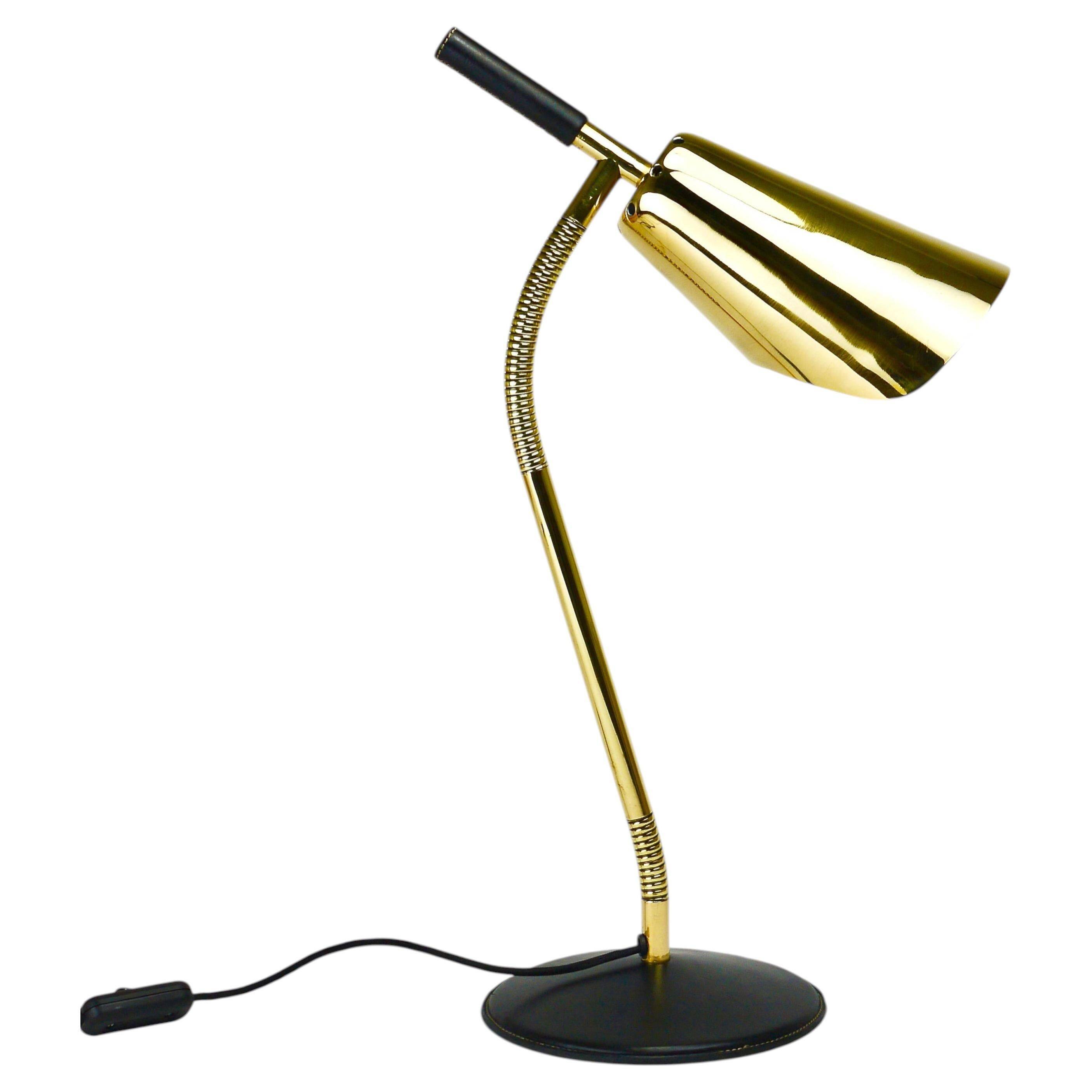 Rare desk and table lamp in brass and leather by Carl Aubock II #4280, Vienna, Austria.