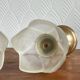 Pair of tulip-shaped candle holders in frosted glass and brass.