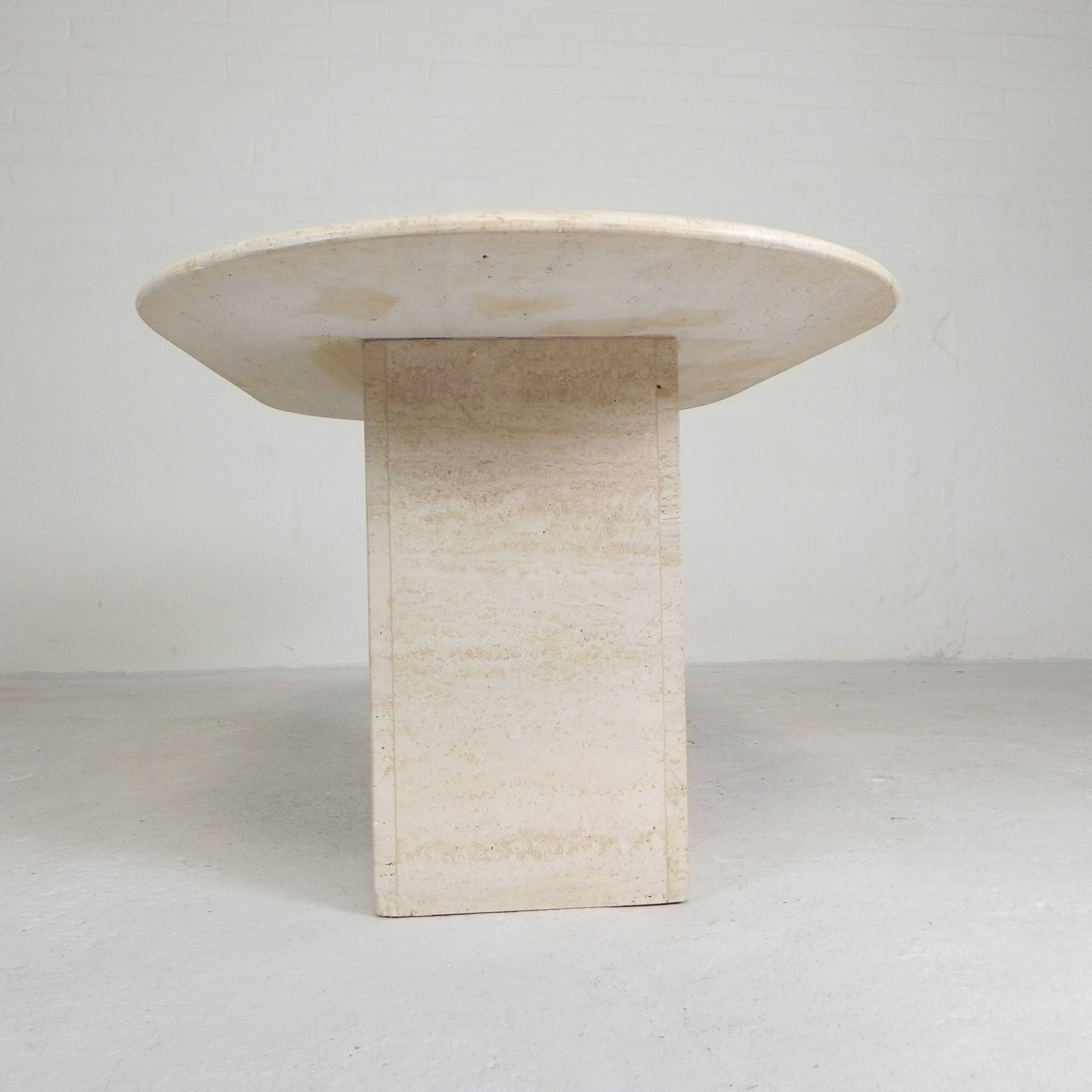 Mid-Century travertine coffee table with an oval top, 1970s.