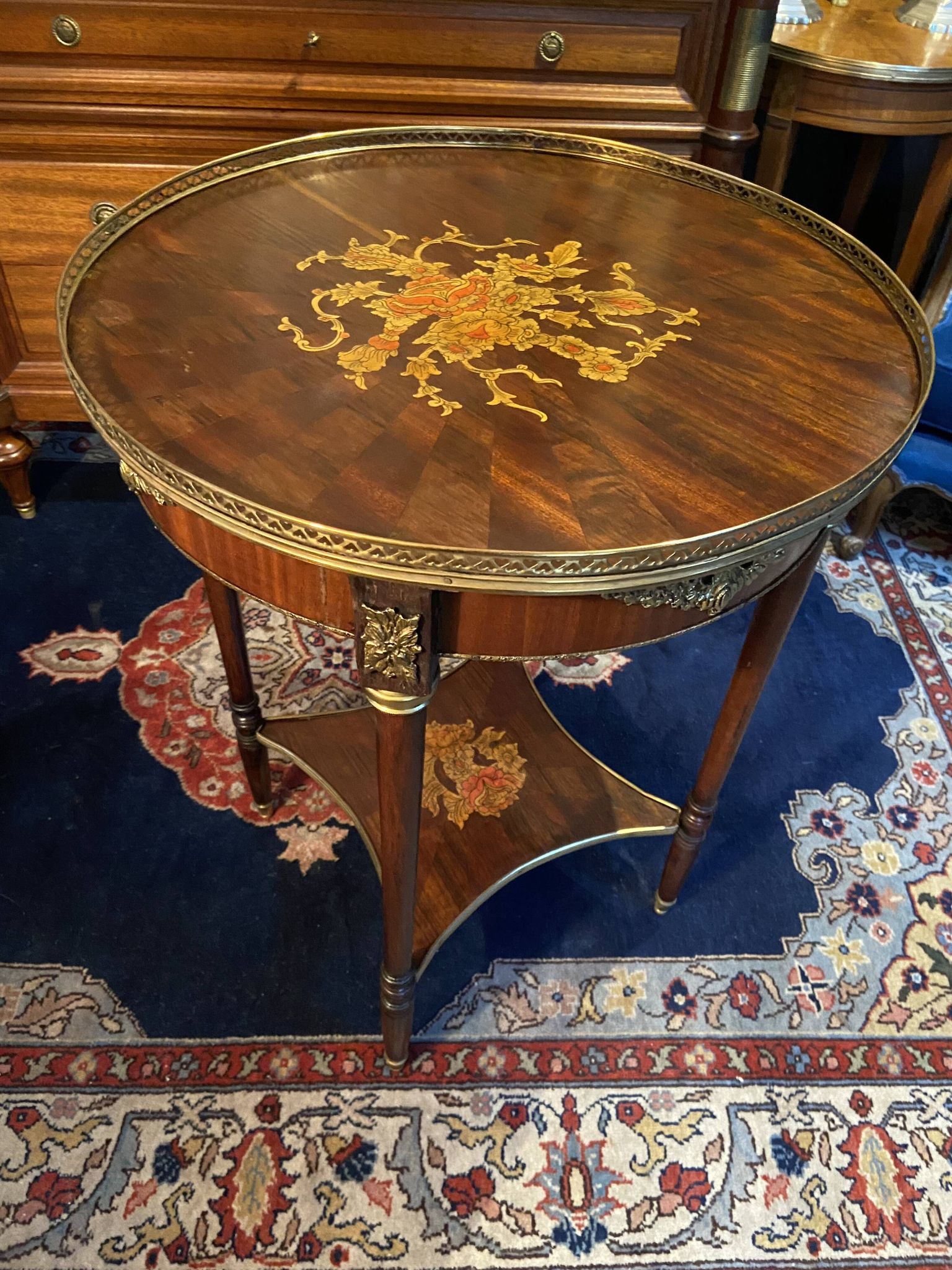 Bouillotte table pedestal table with marquetry decoration and bronze ornaments in the Louis style
