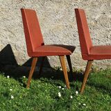 Pair of 1950s lounge chairs in oak and red moleskin.