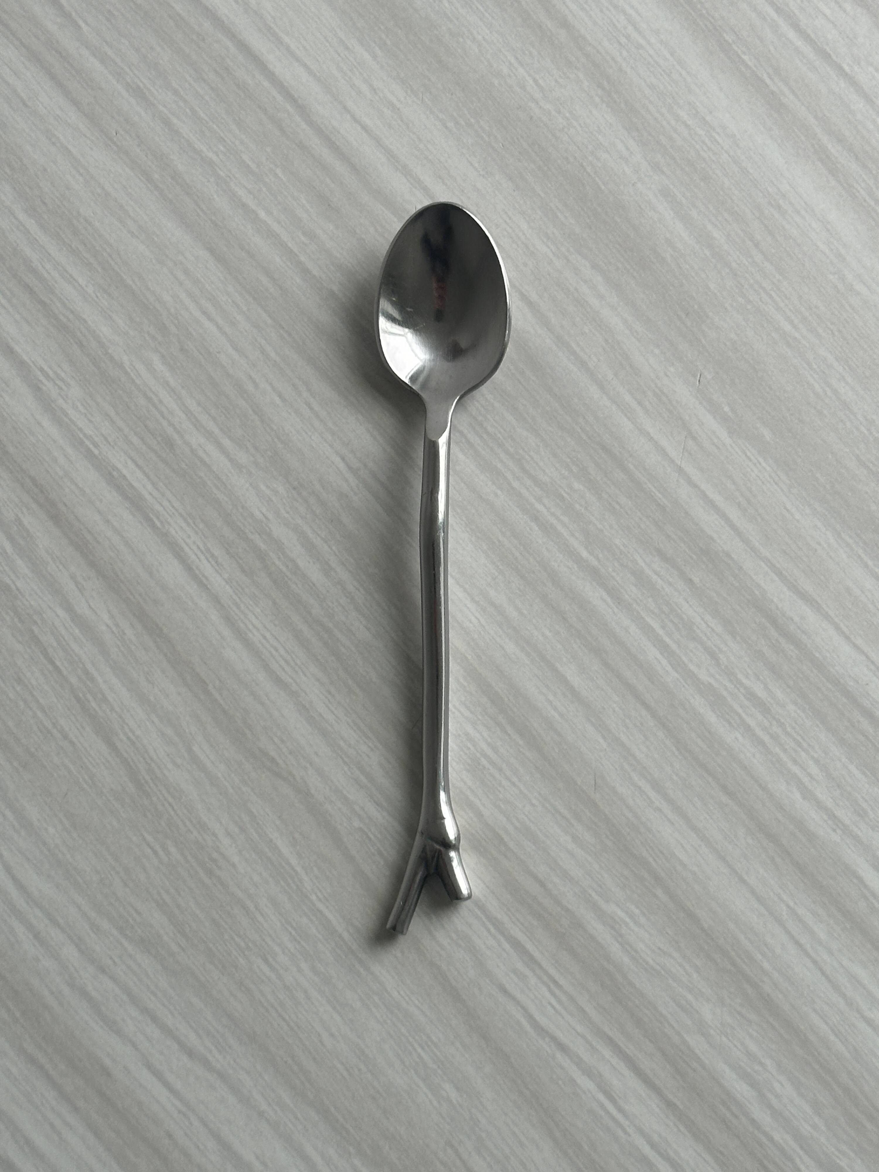 5 small silver metal spoons