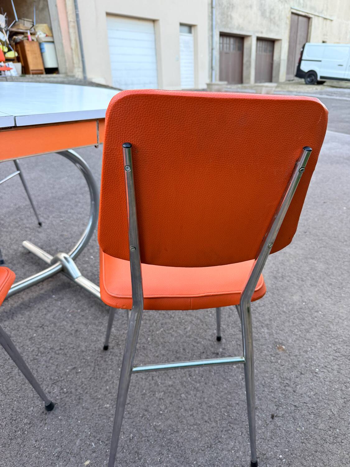 Formica leatherette chair with orange table, vintage 70s Space Age
