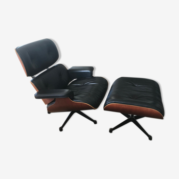 Lounge chair and ottoman by Charles Eames