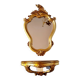 Miroir mural et console dorés de style baroque