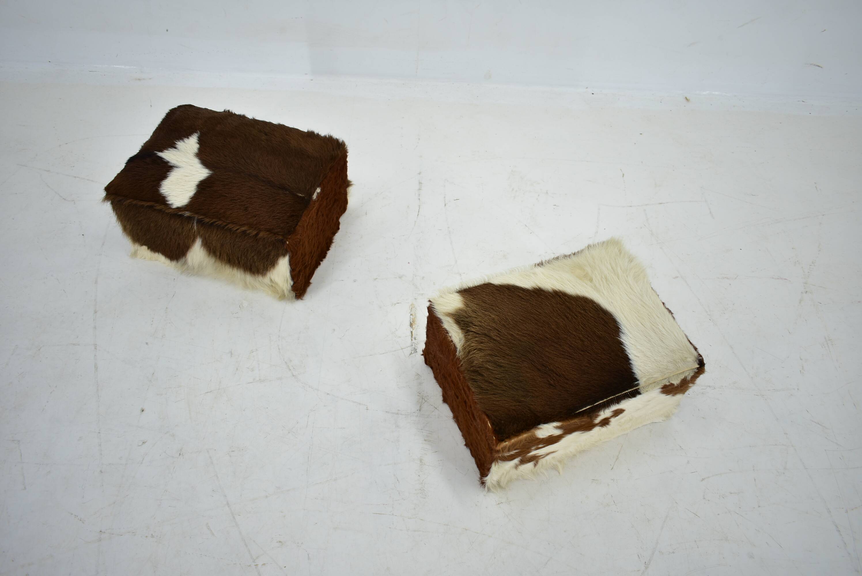 red brown leather cowhide footstools , poufs, 80s