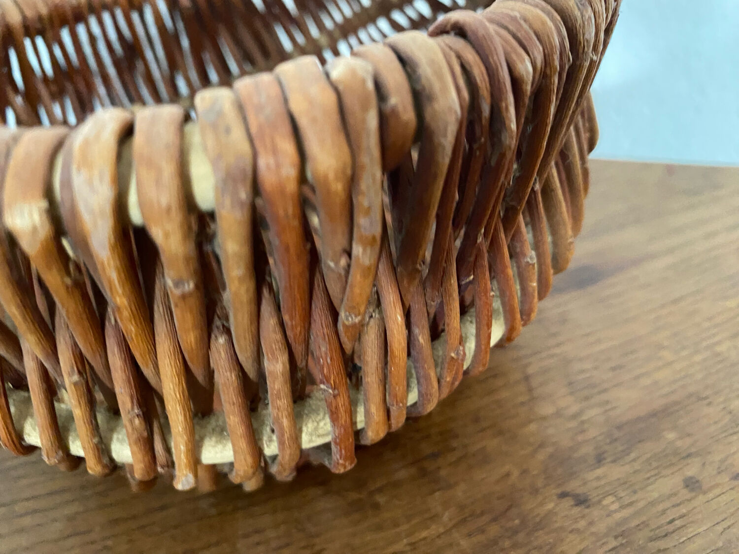 Small handmade basket made of hazel wood.