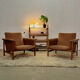 Vintage shelf on legs made of rattan and wood.