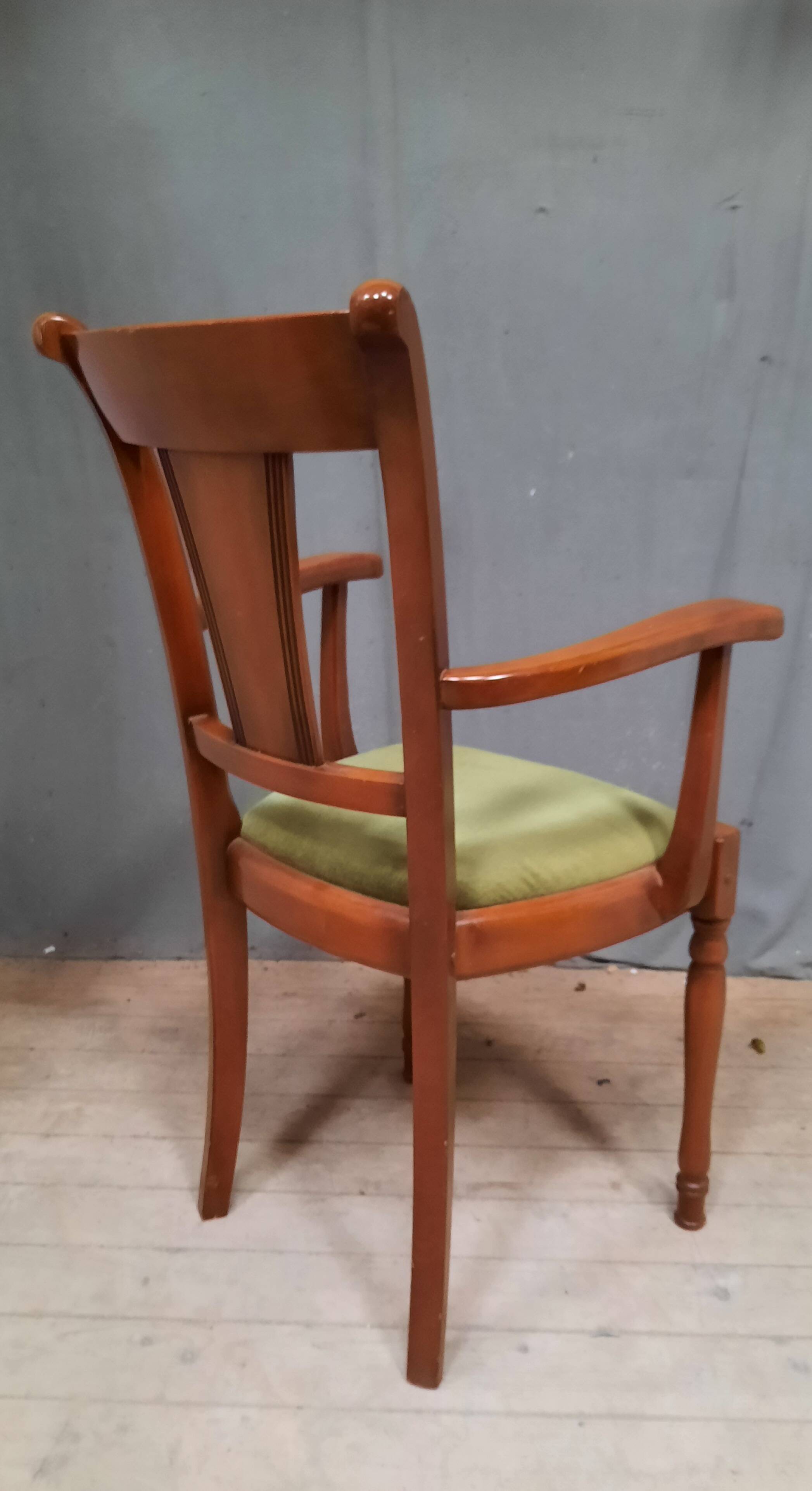 Modern armchair in varnished wood