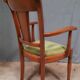 Modern armchair in varnished wood