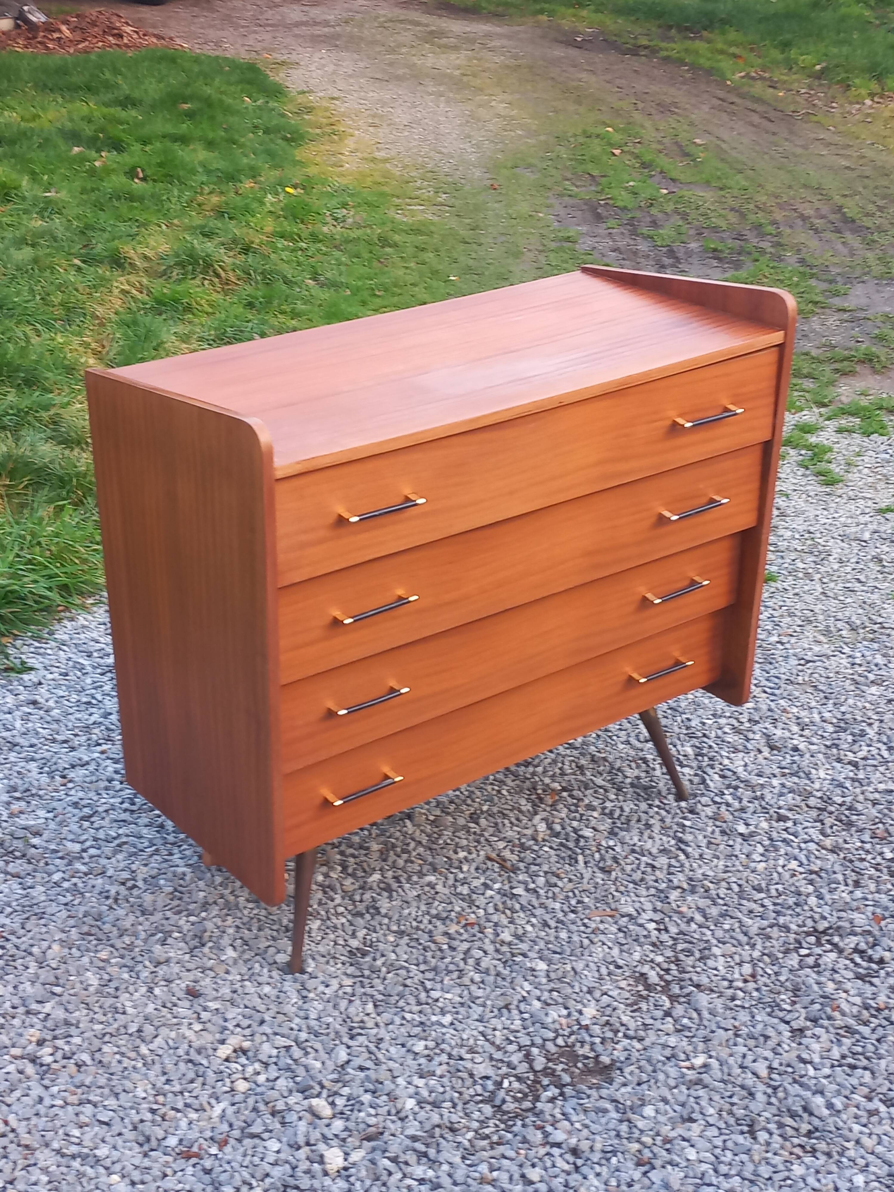 Vintage mahogany commode with metal tapered legs, 4 drawers, 1950s.