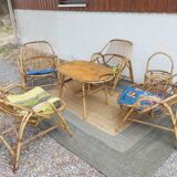 4 armchairs and a coffee table made of rattan and bamboo wood, vintage.