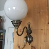 7 Dutch style wall lights with globes