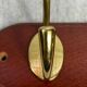 Brass and wood wall hook