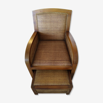 Colonial rattan armchair with ottoman
