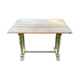 Old table with patinated green legs