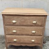 Old three-drawer chest of drawers in raw oak