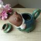 Authentic frog-shaped stoneware teapot made in Japan