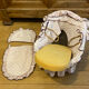 1960s wicker cradle with mattress and drapes.