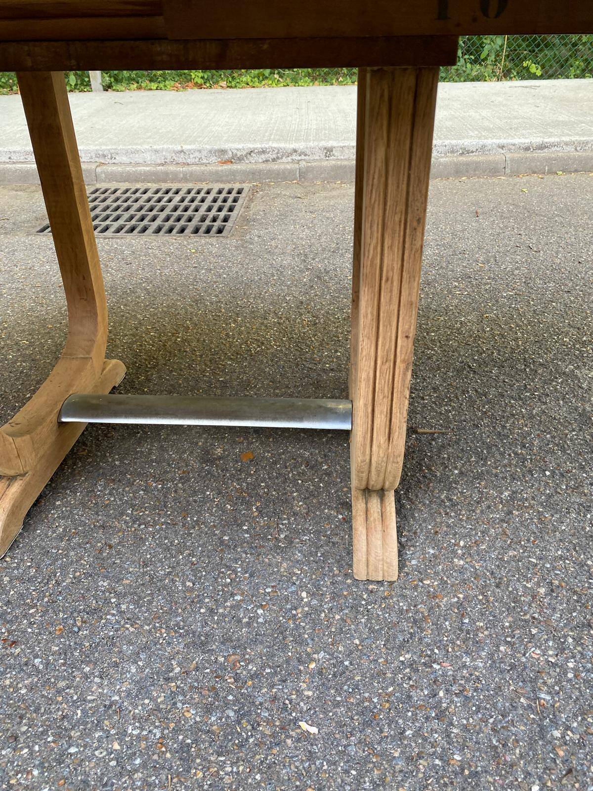 Art Deco dining table with a central pedestal, stripped in solid oak, with 2 extensions.