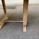Art Deco dining table with a central pedestal, stripped in solid oak, with 2 extensions.