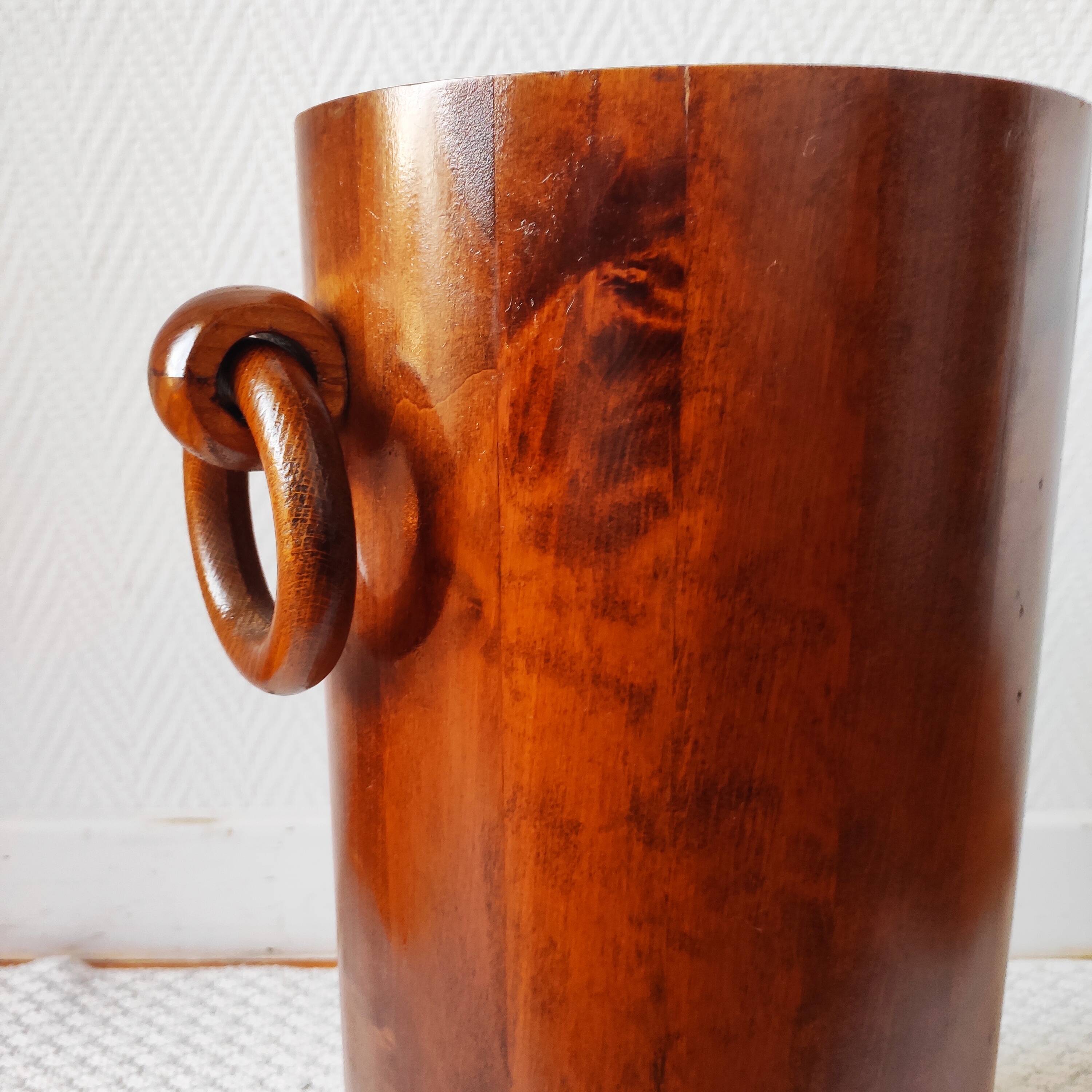 Brutalist sculptural wooden umbrella stand from the 1970s.