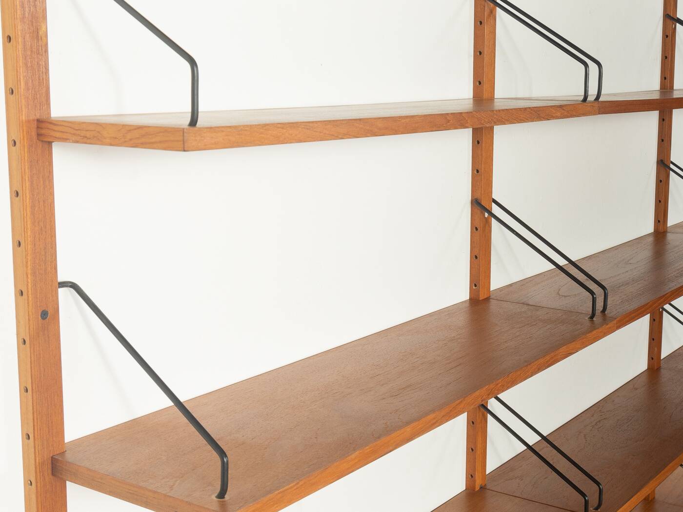 Classic wall shelf by Poul Cadovius for Cado, 1950s, teak veneer, 18 shelves, 4 ladders, Denmark