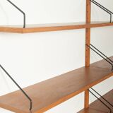 Classic wall shelf by Poul Cadovius for Cado, 1950s, teak veneer, 18 shelves, 4 ladders, Denmark