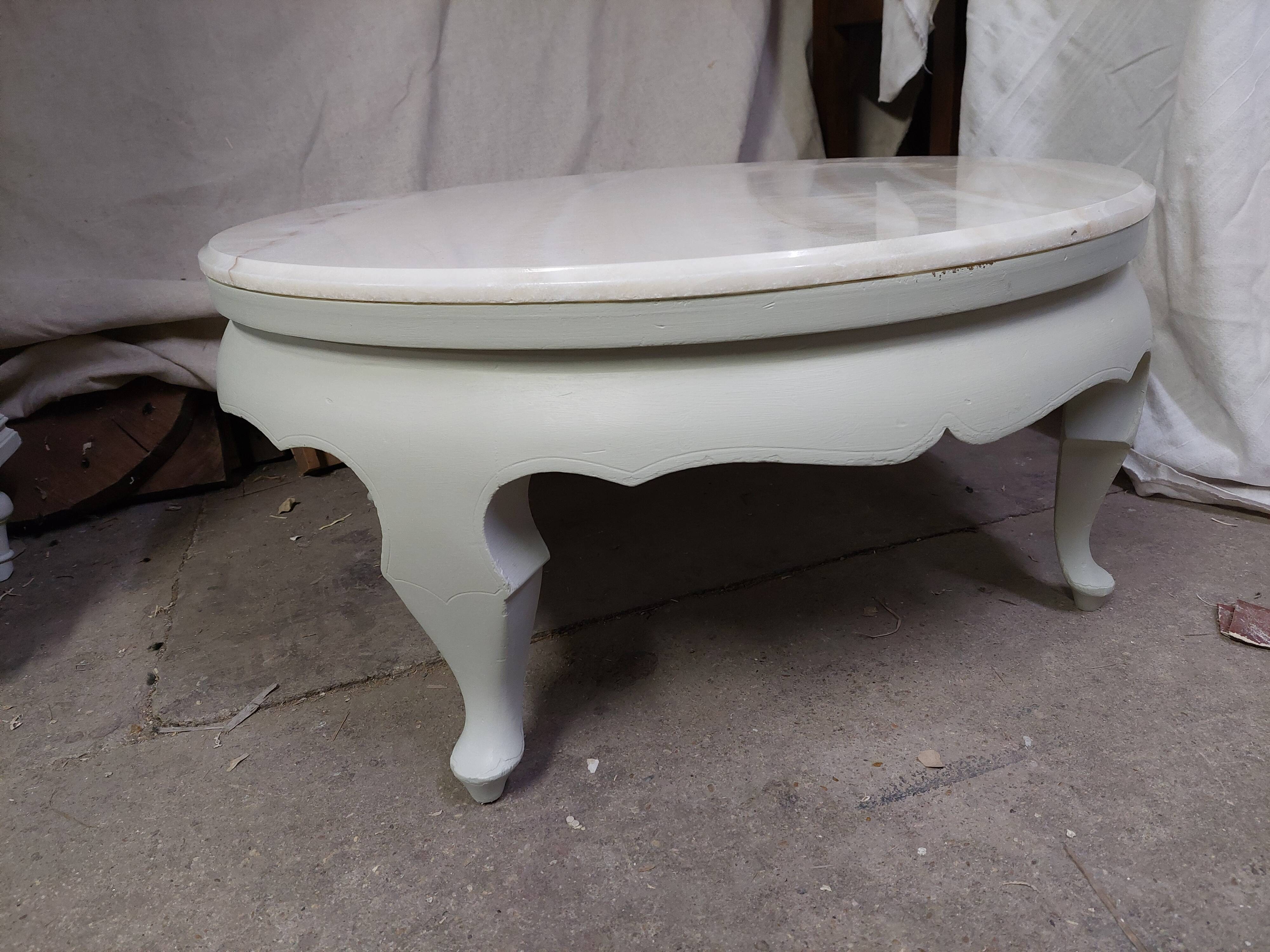 Table basse ronde avec plateau en marbre