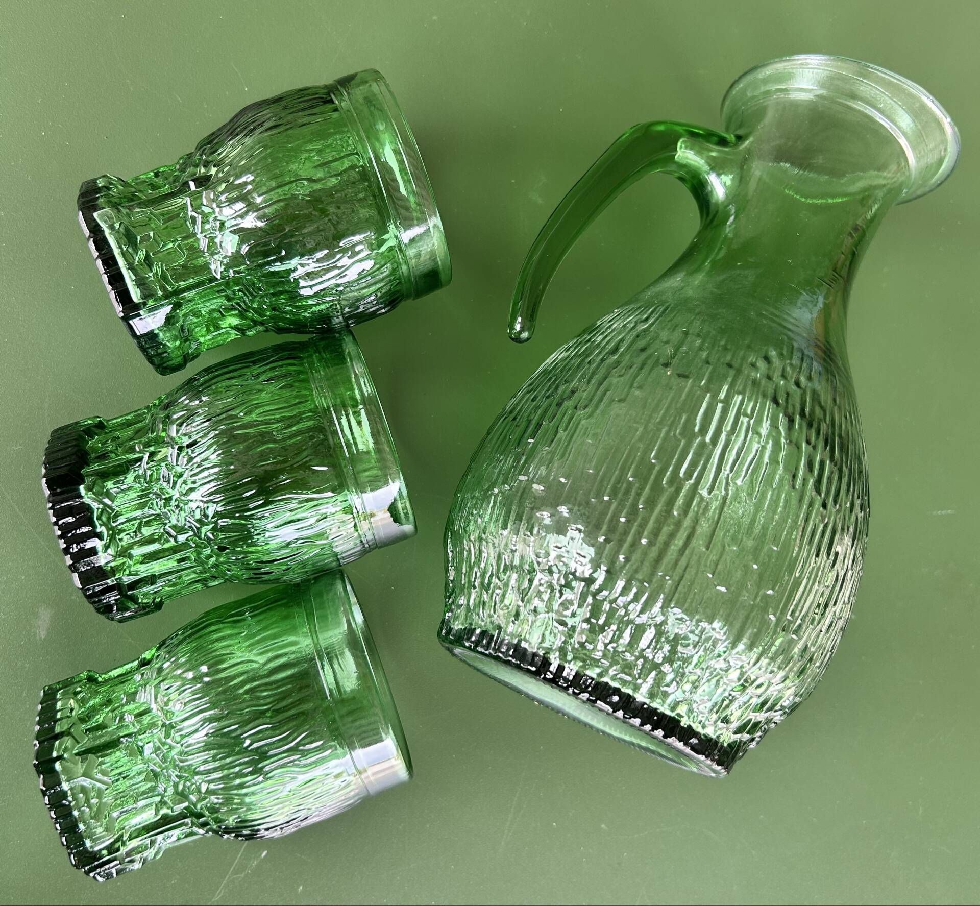 1 carafe and 3 green glasses from the '60s
