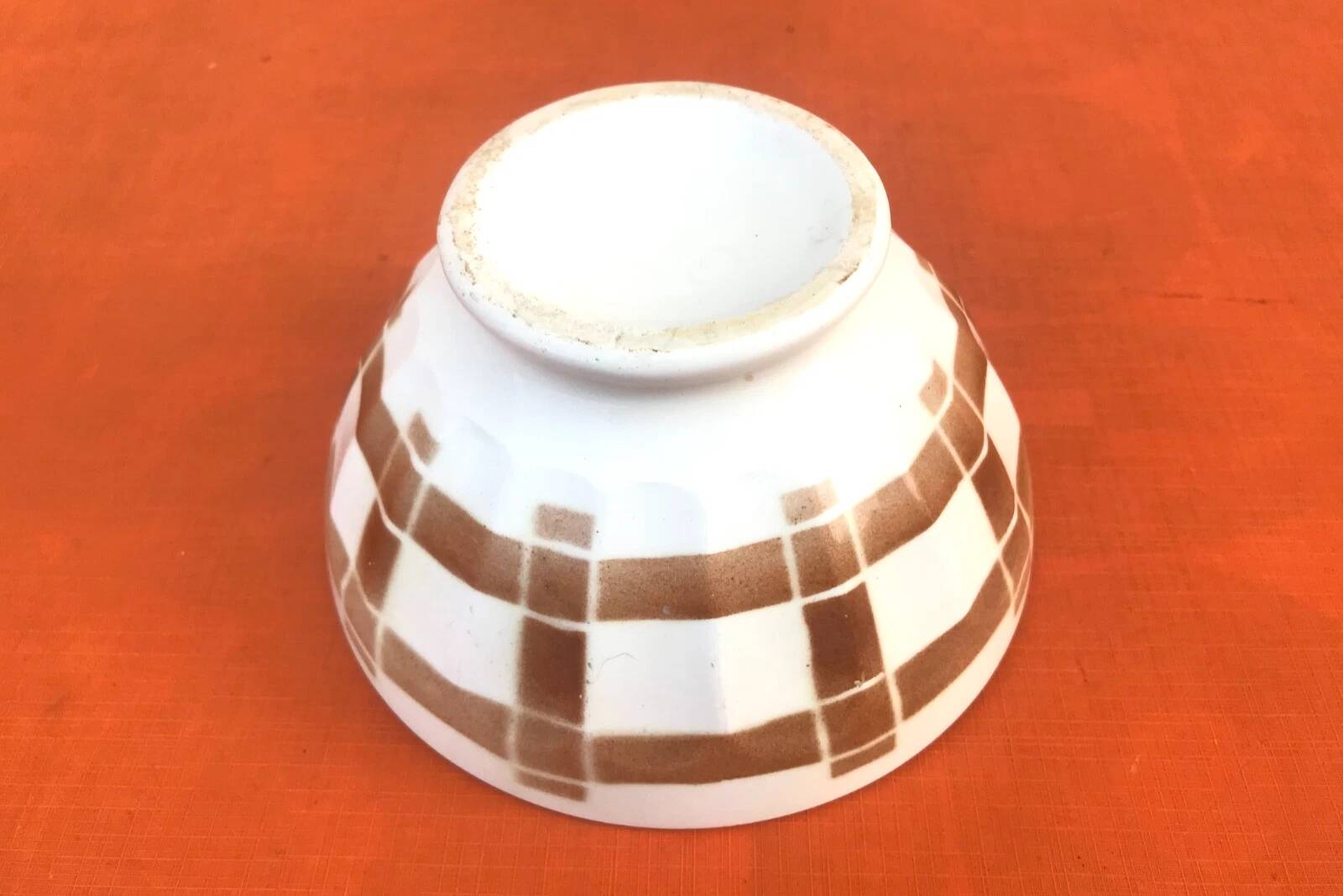 Antique ceramic bowl on a pedestal, faceted model