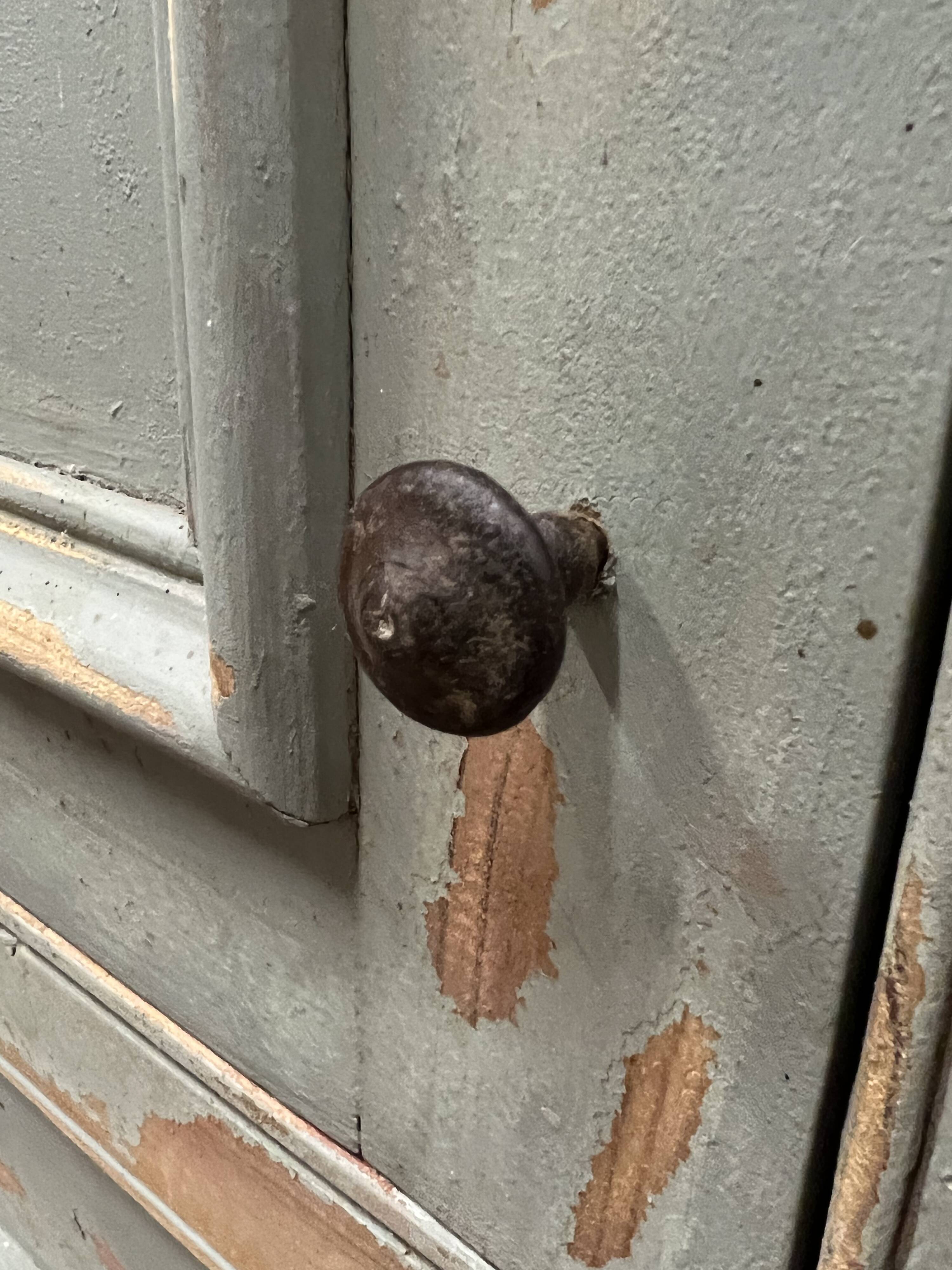 Patinated corner cupboard