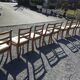 8 chaises en merisier avec assises brodées