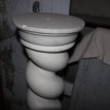 White plaster column, twisted.