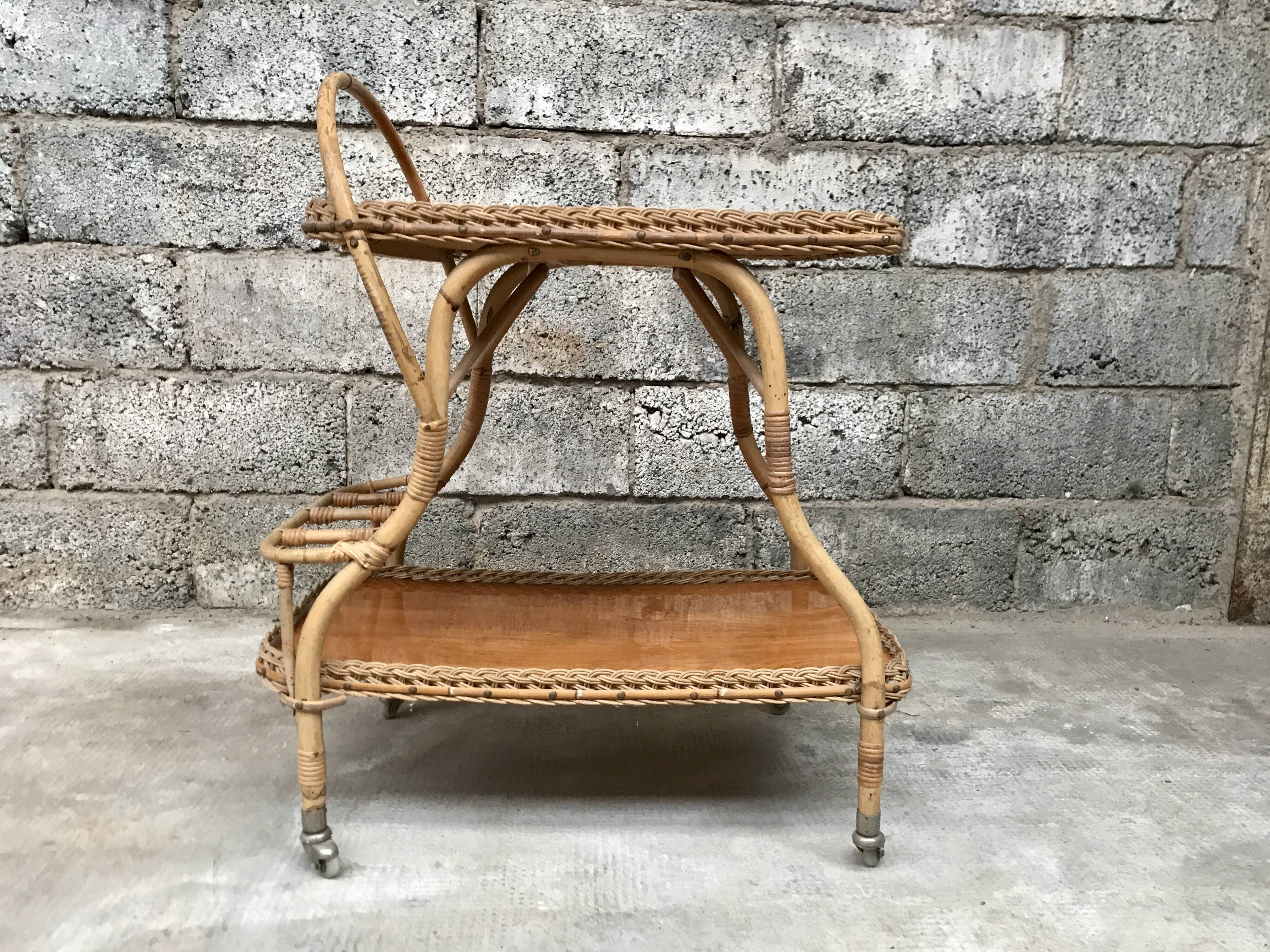 Rolling dessert in woven wicker bamboo rattan with 1950 bottle holder