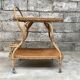Rolling dessert in woven wicker bamboo rattan with 1950 bottle holder
