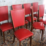 Lot of 8 vintage wooden chairs and red skai