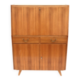 Vintage secretary with drawers, drop-down and doors from the 1960s.