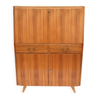Vintage secretary with drawers, drop-down and doors from the 1960s.