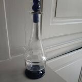 White and blue blown glass carafe