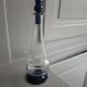 White and blue blown glass carafe