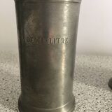 7 pewter measures stamped ed with hallmarks