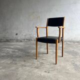 Set of 2 vintage beech wood armchairs with black skai upholstery — mid-century modern