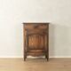 Antique chest of drawers with curved silhouette and patina